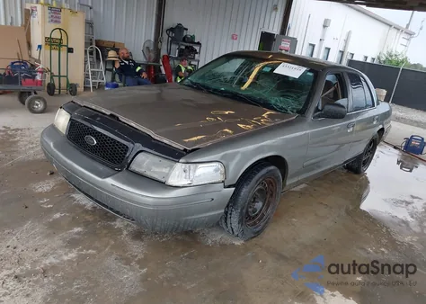 2003 Ford Crown Victoria Police z USA, uszkodzony, nr VIN 2FAFP71W53X101175